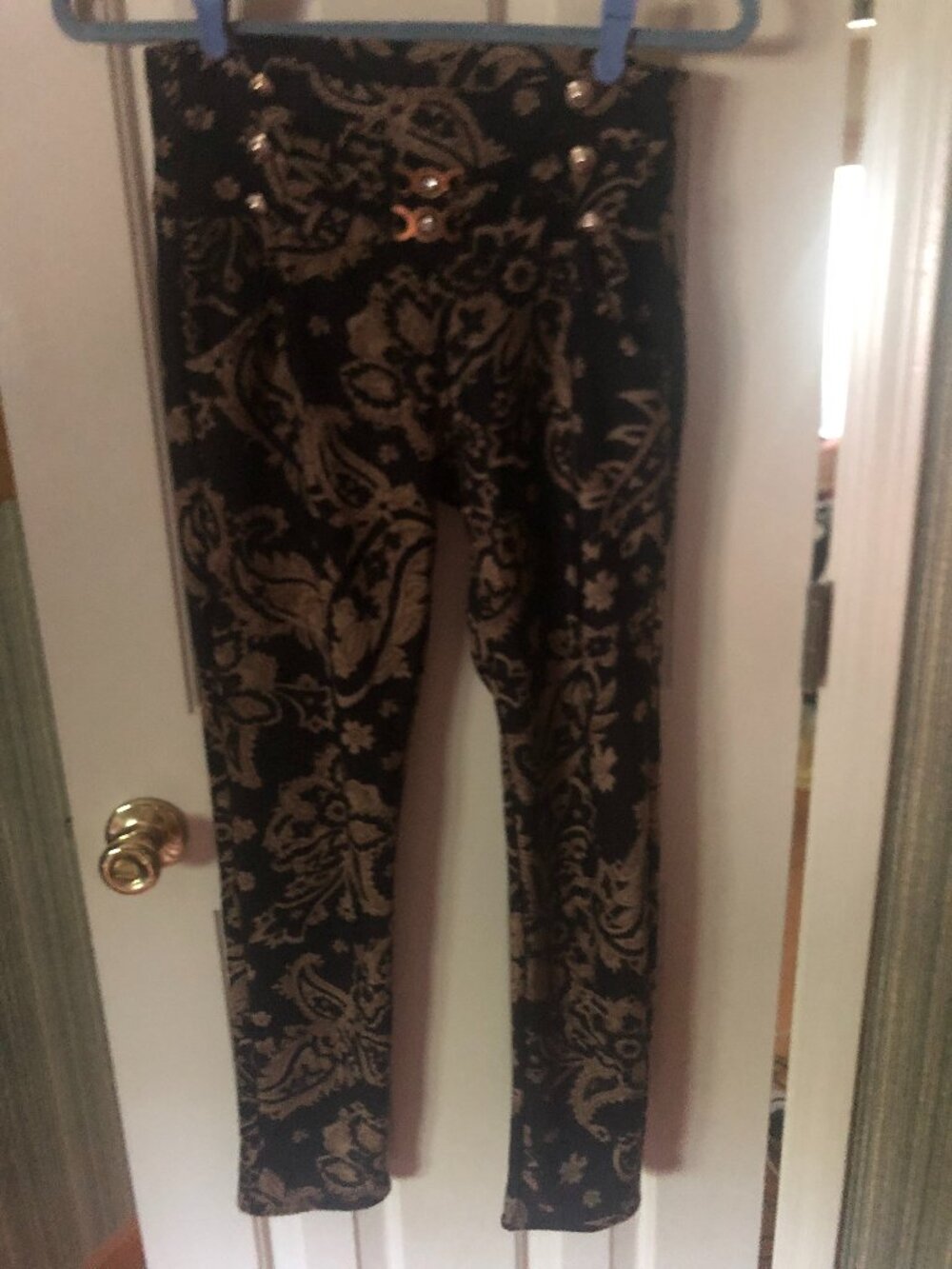 Black and gold patterned with brass buttons in front pull on leggings size XL